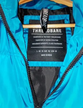 Chaleco largo acolchado con capucha