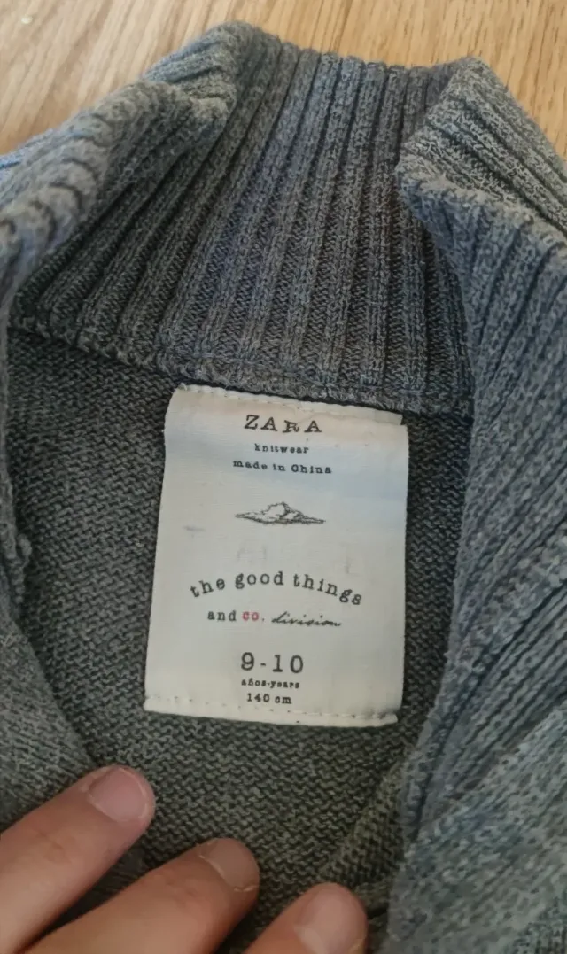 Jersey niño cuello alto cremallera gris