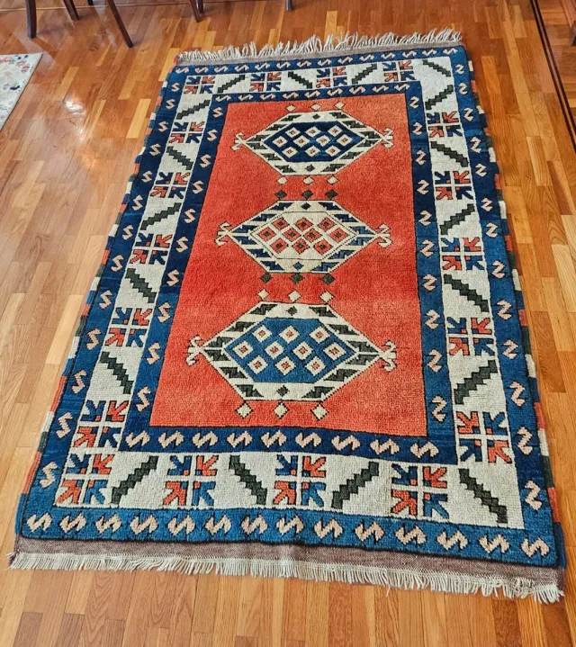 Alfombra turca de lana naranja y azul