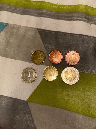 Lote monedas antiguas y  nuevas las podemos vender