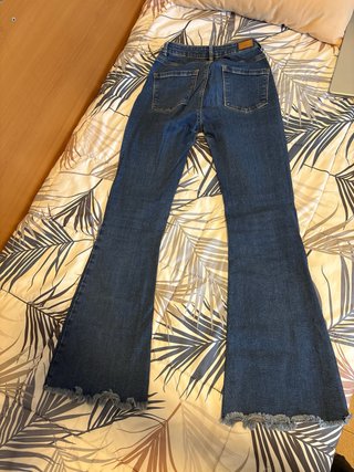 Pantalones vaqueros campana azules y blancos