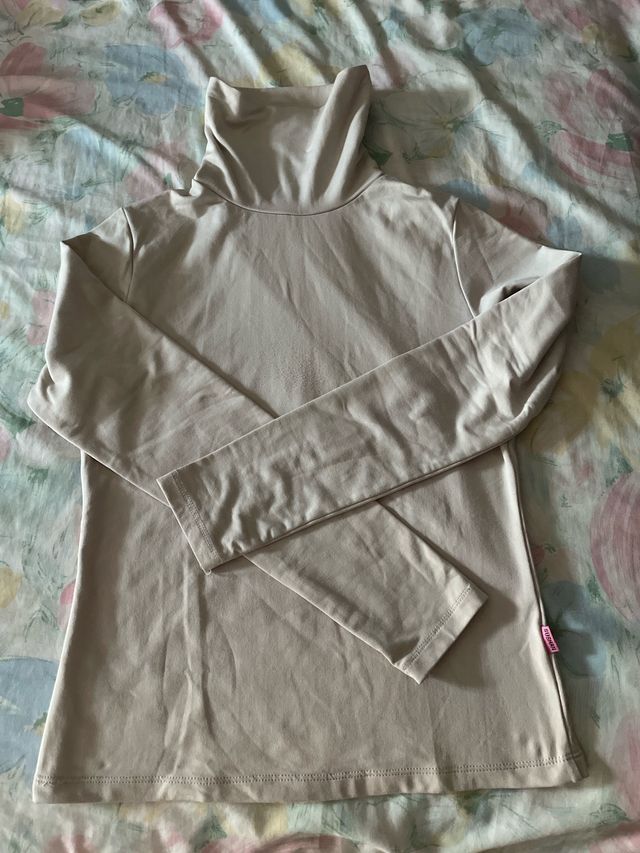 Jersey cuello alto beige