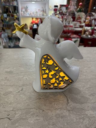 Angelo ceramica con led e stella