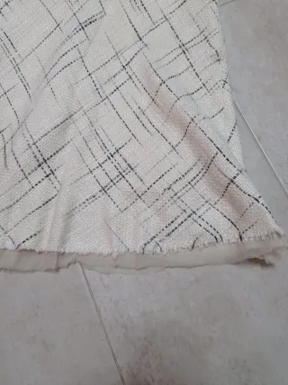 Traje chaqueta y falda blanco y negro