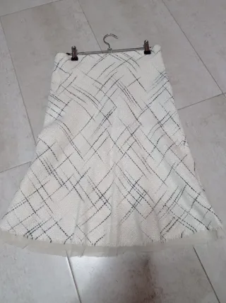 Traje chaqueta y falda blanco y negro