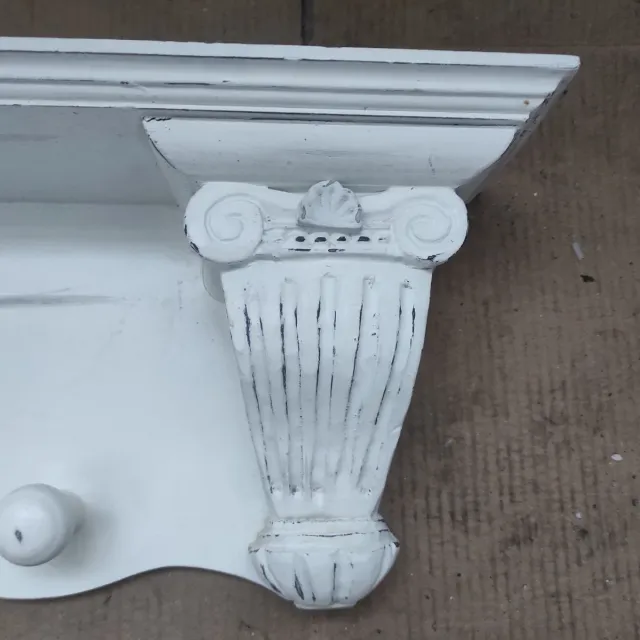 Perchero de madera blanco