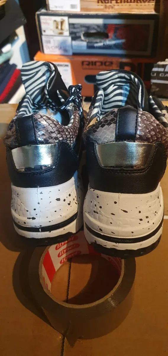 Zapatillas XTI Piel Serpiente Beige/Negro