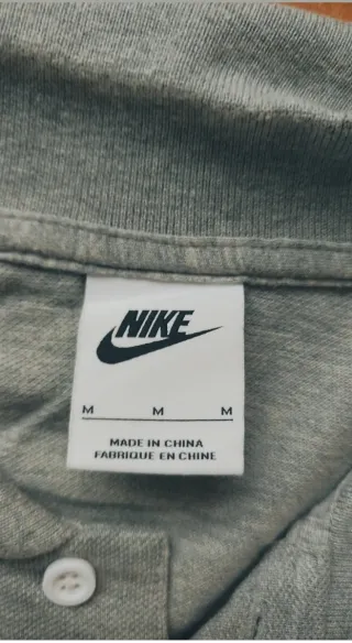Polo Nike gris talla M
