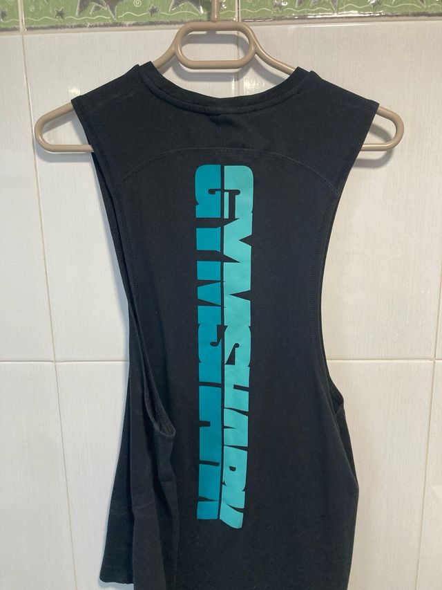 Camiseta tirantes Gymshark negra y turquesa