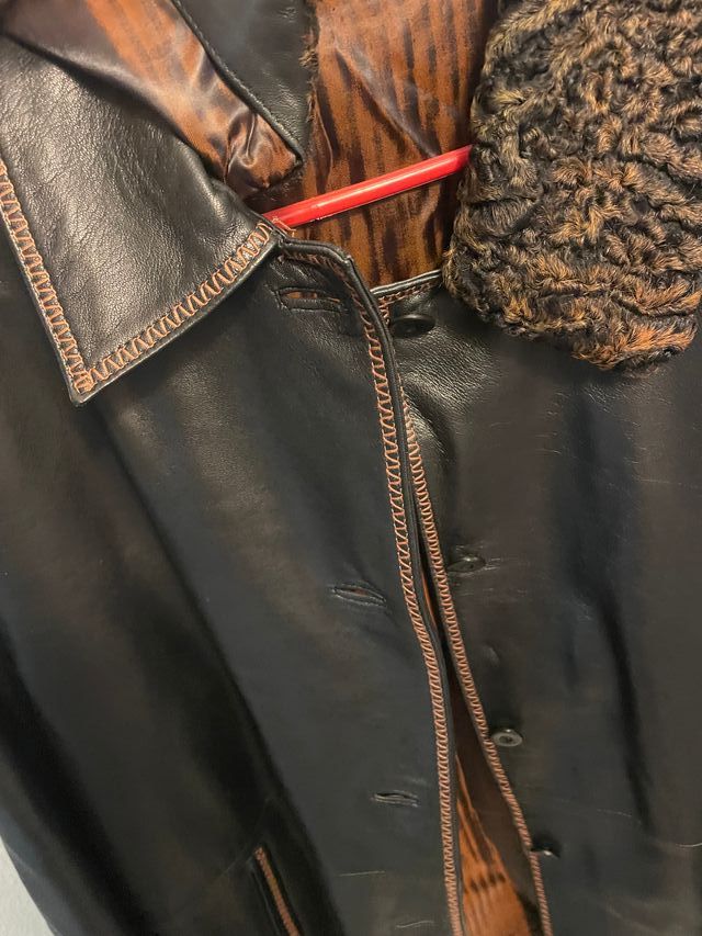 Giacchetta vintage in pelle nera e marrone