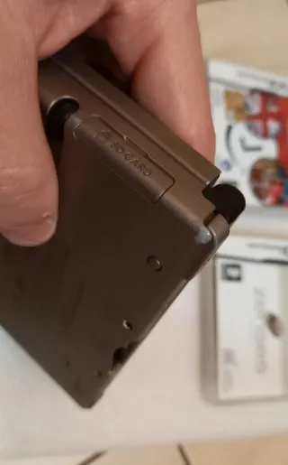 Nintendo DSi XL  +  Giochi