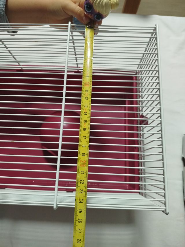 Jaula para mascotas rosa y blanca