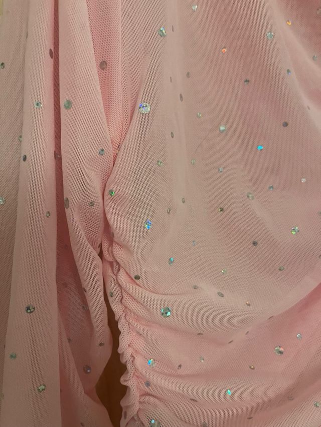 Top rosa brillante asimmetrico