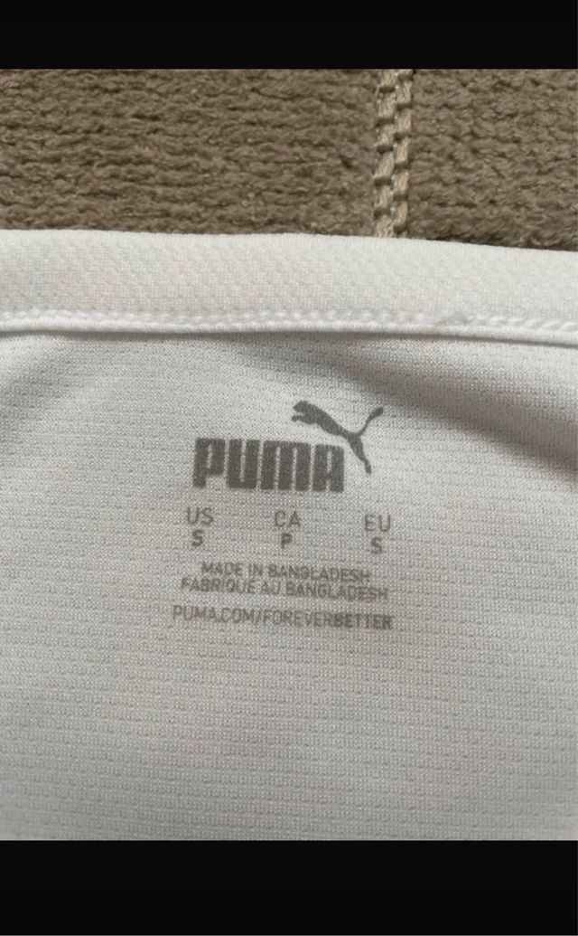 Camiseta Puma blanca con rayas negras