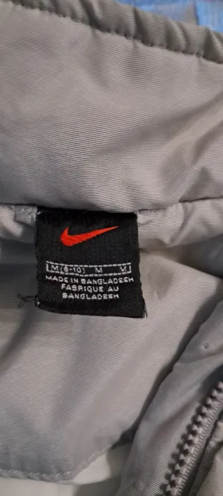 Plumas Nike Talla L Beige