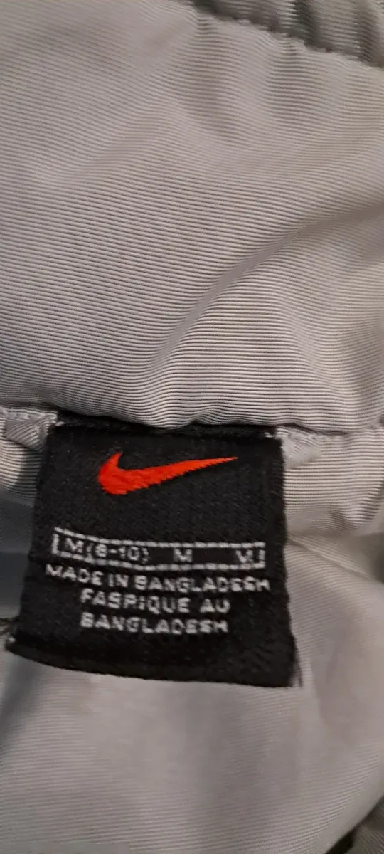 Plumas Nike Talla L Beige