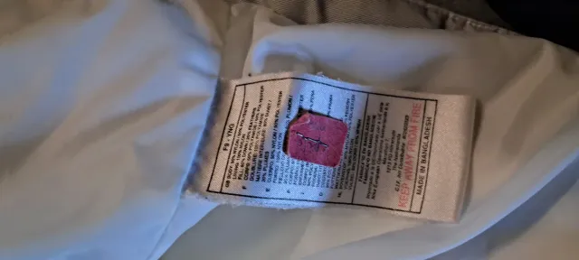 Plumas Nike Talla L Beige