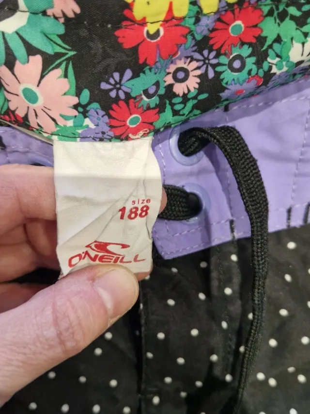 Bañador O'Neill mujer lunares negro y morado