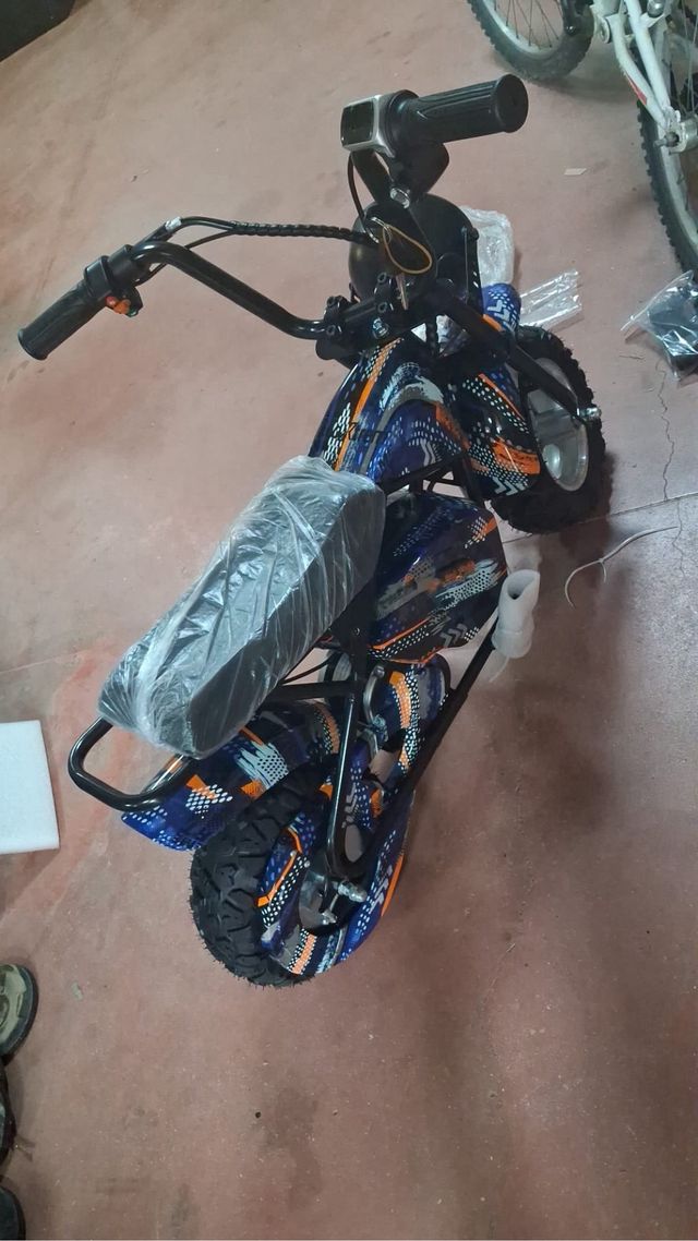 Mini moto eléctrica infantil