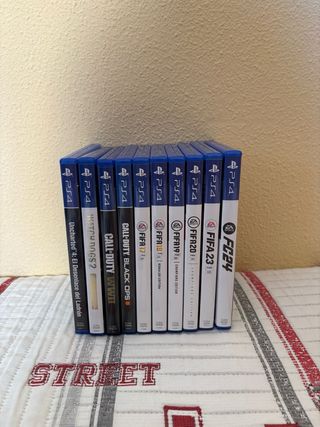 PS4 con 2 mandos y juegos