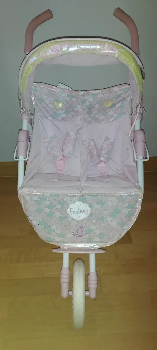 Carro gemelar De Cuevas rosa. Muy nuevo.