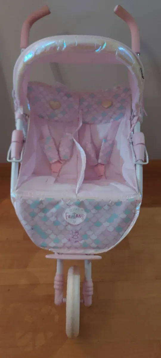 Carro gemelar De Cuevas rosa. Muy nuevo.