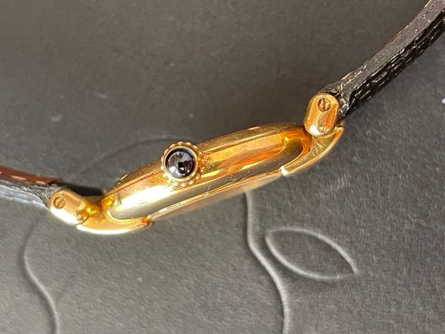 Reloj Cartier Dorado y Negro