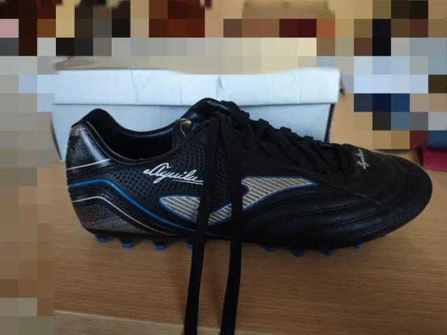 Botas de futebol Joma Negras e Azuis