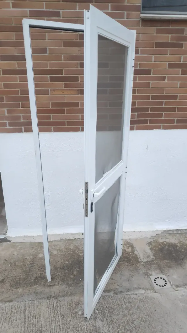 Puerta aluminio mosquitera