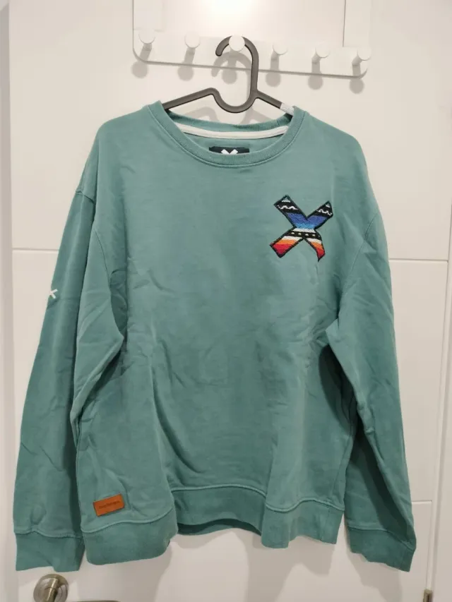Sudadera unisex verde con estampado X