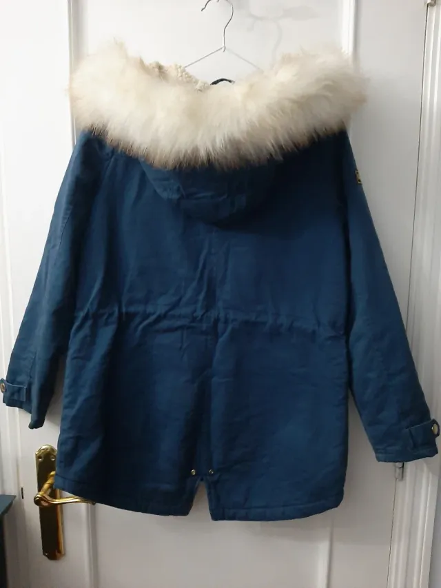 Parka azul con borreguito