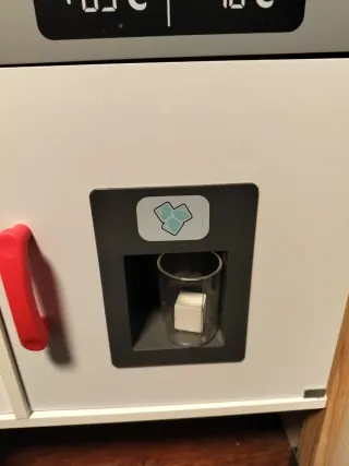 Cocina de madera infantil con todos sus accesorios