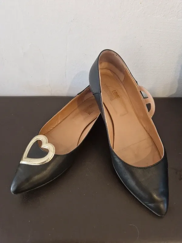 Zapatos planos Love Moschino corazón dorado