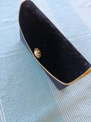 Cartera de mano fiesta negra y dorada terciopelo