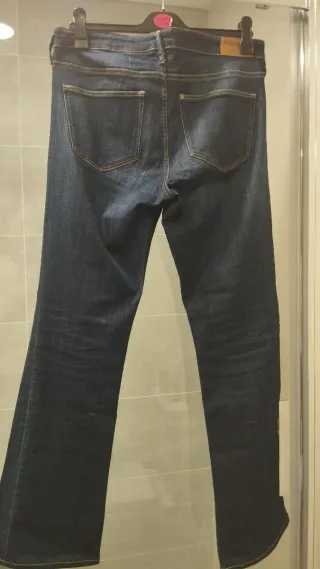 Pantalón bootcut cintura regular
