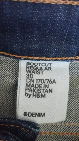 Pantalón bootcut cintura regular