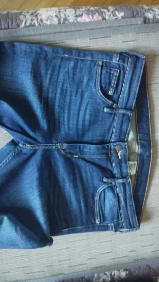 Pantalón bootcut cintura regular