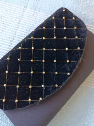 Cartera de mano fiesta negra y dorada