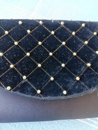 Cartera de mano fiesta negra y dorada