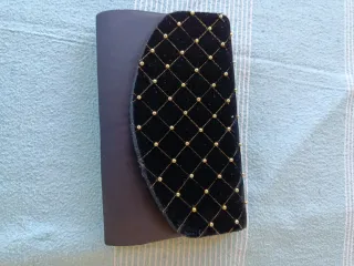 Cartera de mano fiesta negra y dorada