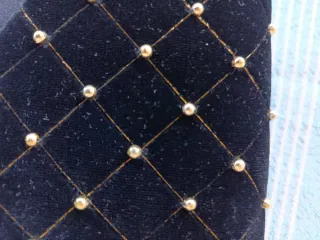 Cartera de mano fiesta negra y dorada