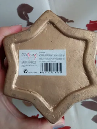 Vaso natalizio oro e rosso a forma di stella