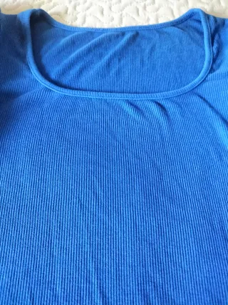 Body azul eléctrico manga abullonada