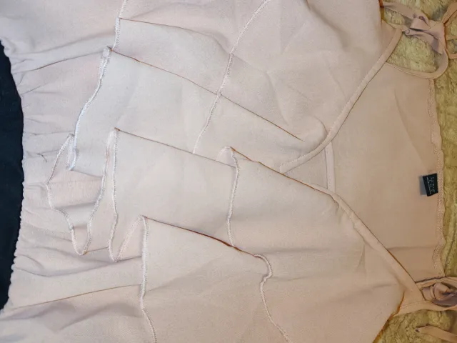 Body de tirantes rosa y negro