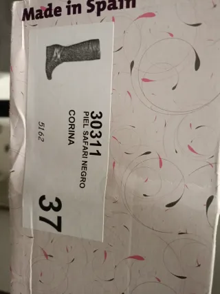 Botas altas de piel negras sin estrenar