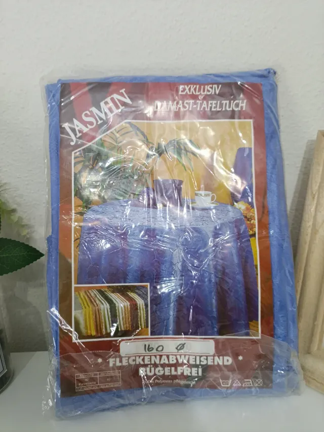 Dos manteles redondos tela azul y verde