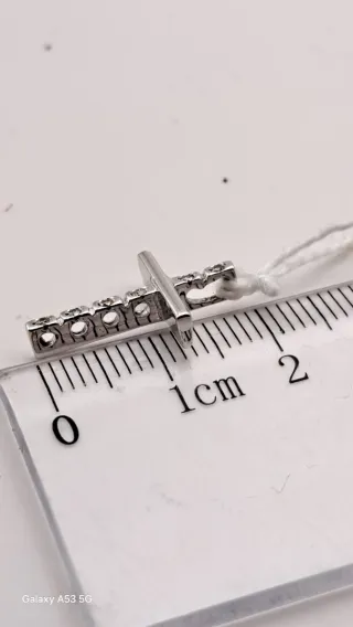 Cruz oro 18k con diamantes