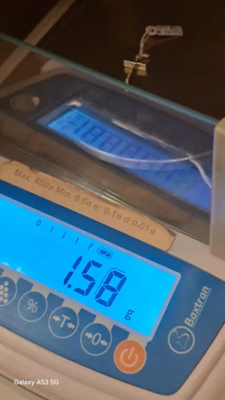 Cruz oro 18k con diamantes