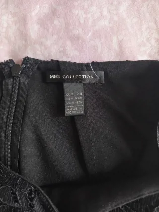 Falda de encaje negra midi