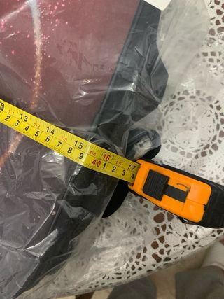 Mochila multicolor con diseño espacial, sin usar.